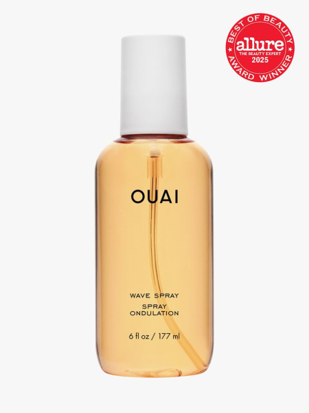 OUAI Wave Spray in branded orange bottle with white cap on light gray background with red Allure Best of Beauty seal in the top right corner