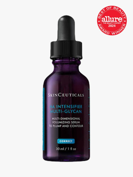 serum in branded purple bottle with black pipette on light gray background with red and white 2024 allure best of beauty seal